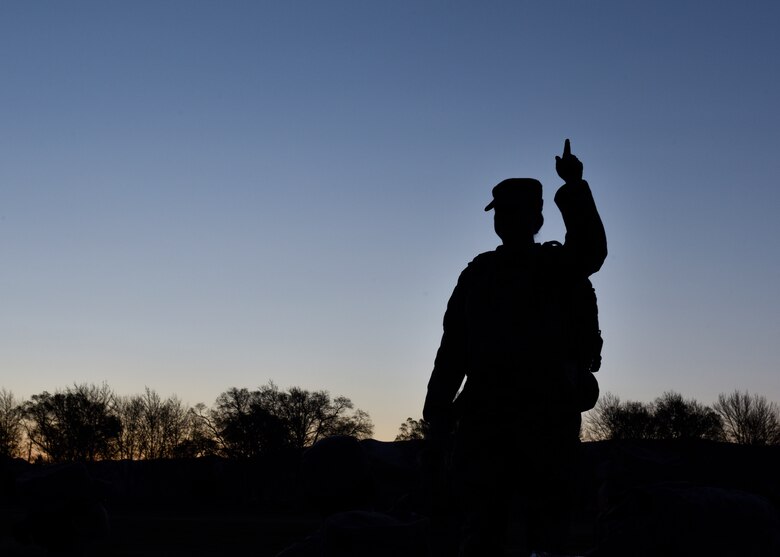 U.S. Air Force Master Sgt. Heather Geer, 377th Security Forces Squadron Plans and Programs superintendent, gives directions at Kirtland Air Force Base, N.M., March 29, 2019. The 377th Security Forces Squadron Suicide Awareness Ruck March was created to support The Brave Badge Initiative Facebook page. The Facebook page was created due to the increased rates in suicide in the security forces career field in the past year and aims to give Defenders another place to go to when they are struggling with mental health issues.  (U.S. Air Force photo by Airman 1st Class Austin J. Prisbrey)