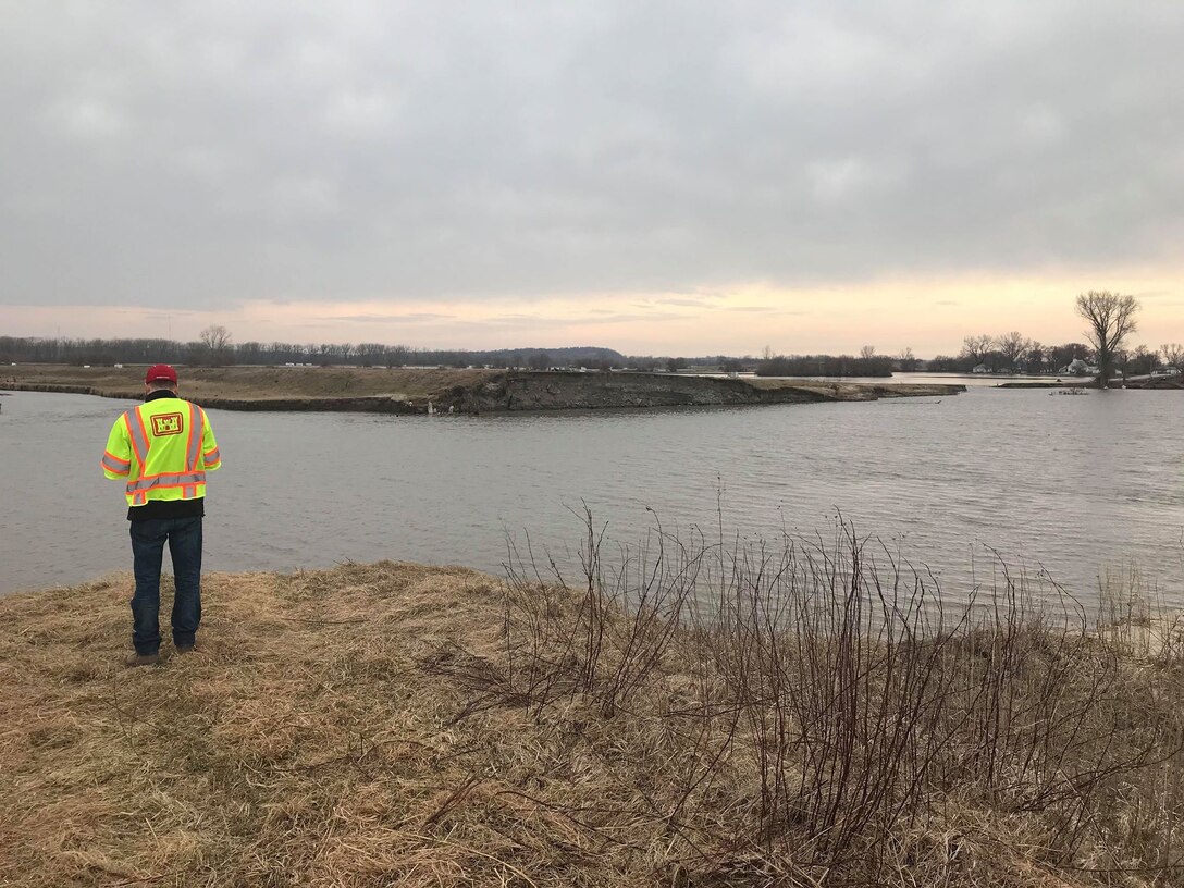 A USACE, Omaha District employee assesses the area near breached levee L611 south of Council Bluffs, Iowa Mar. 29, 2019. (Photo by USACE, Omaha District)