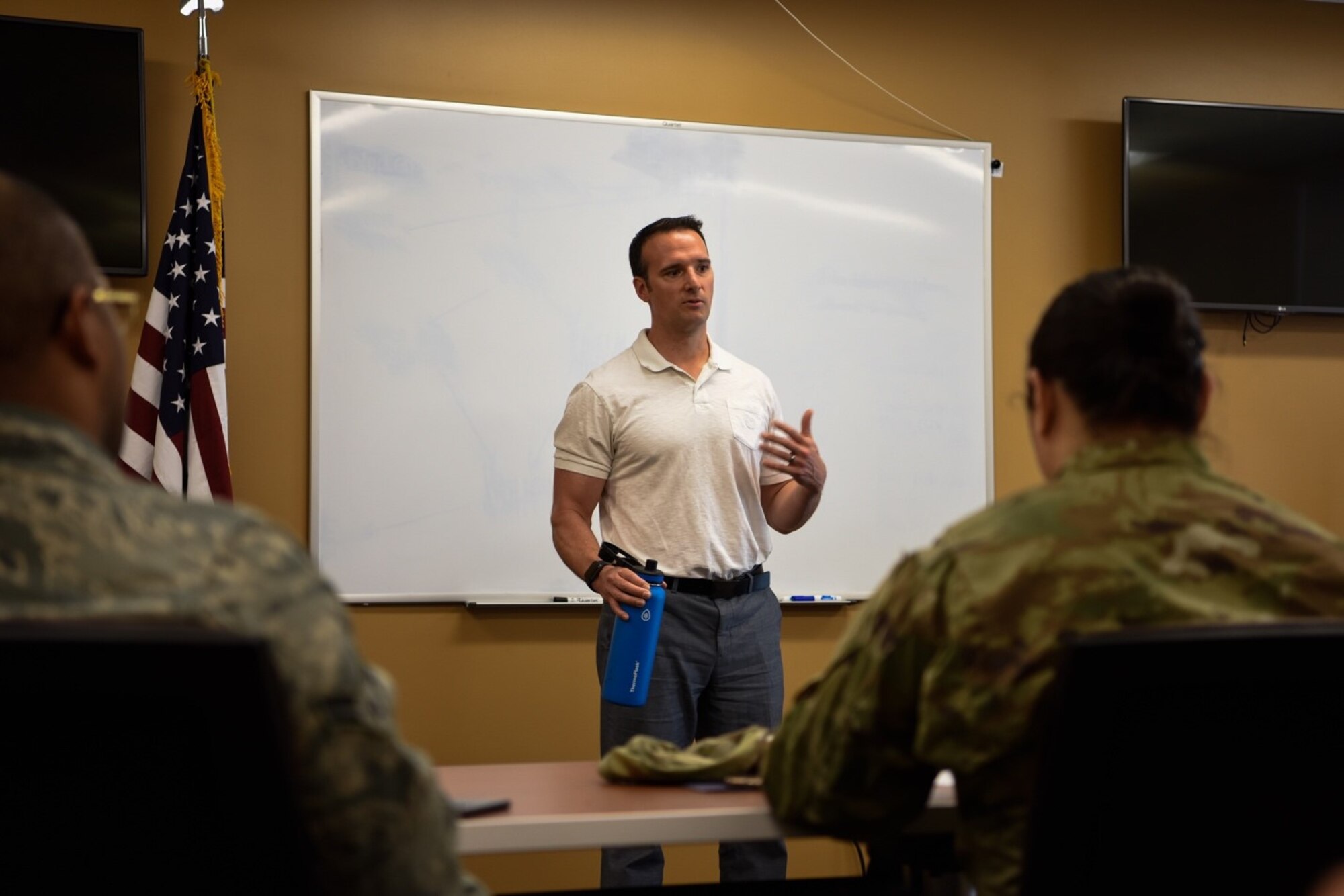 Dr. John Gassaway, Clinical Sports Psychologist with the Human Performance Team teaches participants of the Group Lifestyle Balance Program about SMART goals, March 26, 2019, at Luke Air Force Base, Ariz. Education classes are offered once a week and cover an array of nutritional topics such as healthy food choices, exercise tips and goal-setting guidance. (U.S. Air Force Photo by Senior Airman Monet Villacorte)