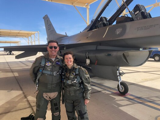 Col. Angela Suplisson, Air Force Test Center vice commander, and Bill Gray, Air Force Test Pilot School chief test pilot, pose for a photo in front of a TPS F-16. Suplisson graduated from the TPS in 1995 and is set to retire later this year. (U.S. Air Force photo courtesy of Col. Angela Suplisson)