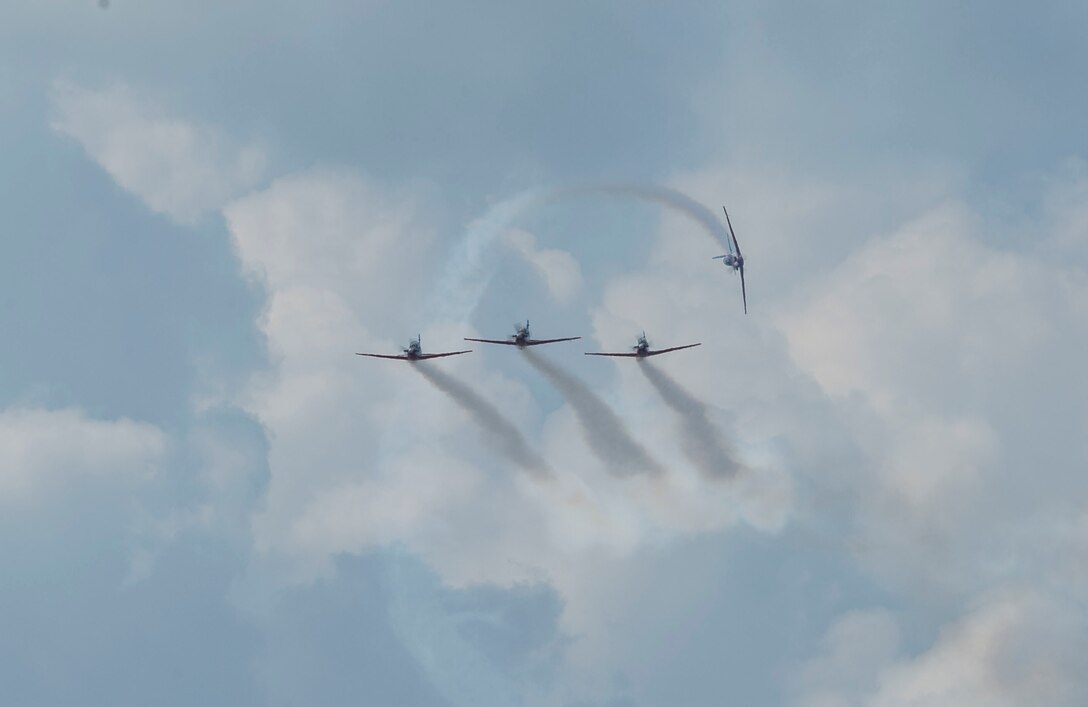 Aerial performers from around the world take to the skies during the Langkawi International Maritime and Aerospace Exhibition 2019 in Padang Mat Sirat, Malaysia, March 29, 2019.