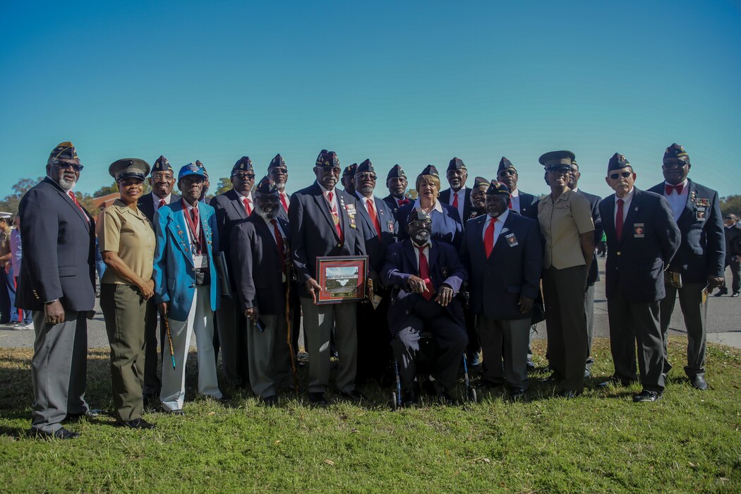 Members of the Montford Point Marine Association get together following the graduation of India Company, 3rd Recruit Training Battalion at the Peatross Parade Deck on Marine Corps Recruit Depot Parris Island, S.C., Mar. 29, 2019. The first African Americans Marines were trained at Camp Montford Point in Jacksonville, N.C., from 1942-1949.  (Photo by Lance Cpl. Shane Manson)