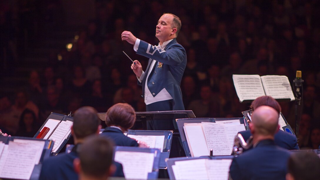 Col. Don Schofield, commander and conductor of The United States Air Force Band, conducts the Concert Band during the Band's 2019 Guest Artist Series featuring world-renowned trumpeter, Allen Vizzutti. The concert took place on Jan. 24, 2019, at the Rachel M. Schlesinger Concert Hall and Arts Center in Alexandria, Va. (U.S. Air Force photo by Chief Master Sgt. Kevin Burns)