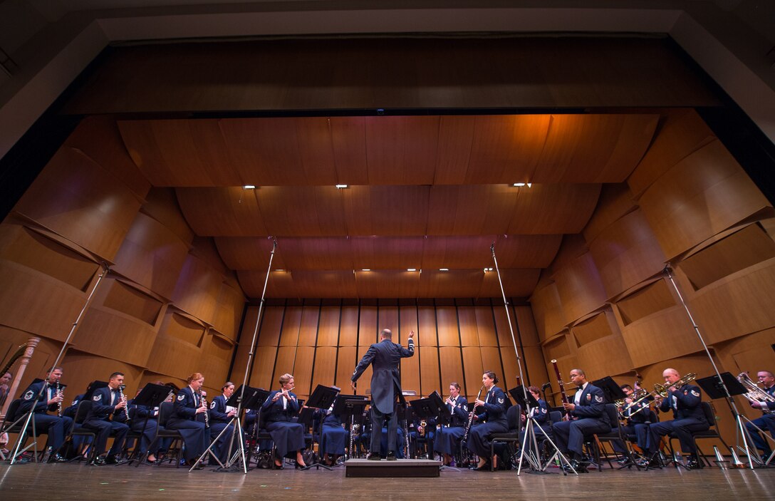 Col. Don Schofield, commander and conductor of The United States Air Force Band, conducts the Concert Band during the Band's 2019 Guest Artist Series featuring world-renowned trumpeter, Allen Vizzutti. The concert took place on Jan. 24, 2019, at the Rachel M. Schlesinger Concert Hall and Arts Center in Alexandria, Va. (U.S. Air Force photo by Chief Master Sgt. Kevin Burns)