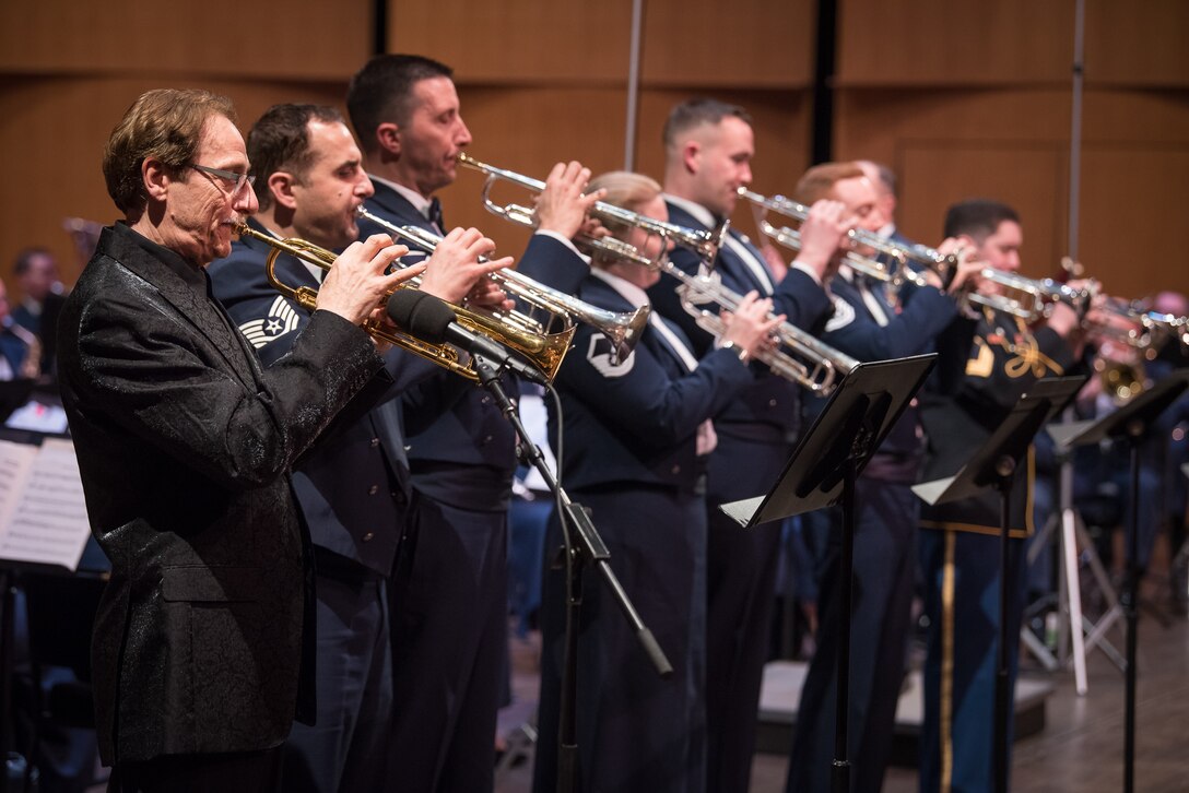 World-renowned trumpeter, Allen Vizzutti, left, lines up with the trumpet section on The United States Air Force Band's 2019 Guest Artist Series. The concert took place on Jan. 24, 2019, at the Rachel M. Schlesinger Concert Hall and Arts Center in Alexandria, Va. (U.S. Air Force photo by Chief Master Sgt. Kevin Burns)