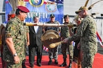 KUCHING, Malaysia (March 30, 2019) – U.S. Navy Capt. Randy Van Rossum, Pacific Partnership 2019 mission commander, rings the ceremonial gong to open Pacific Partnership 2019 in Malaysia. Pacific Partnership, now in its 14th iteration, is the largest annual multinational humanitarian assistance and disaster relief preparedness mission conducted in the Indo-Pacific. Each year the mission team works collectively with host and partner nations to enhance regional interoperability and disaster response capabilities, increase security and stability in the region, and foster new and enduring friendships in the Indo-Pacific.