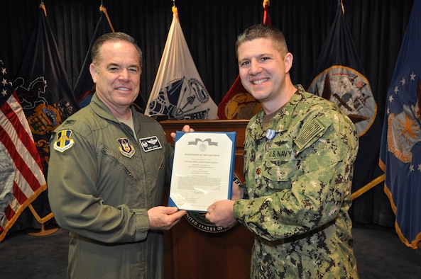 Navy commander receives Air Force medal