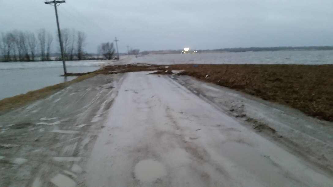 Photo documents overtopping of Western Sarpy levee in Western Sarpy, Nebraska Mar. 14, 2019, resulting from major runoff event earlier in month. (Photo by USACE, Omaha District)