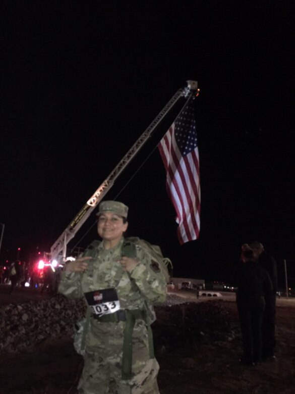 U.S. Air Force Senior Master Sgt. Ruby Tilley, 8th Fighter Wing command post command and control operations superintendent, starts her 26 mile trek for the 30th annual Bataan Memorial Death March in White Sands Missile Range, N.M., March 17, 2019. Tilley completed the march while wearing a 35 pound rucksack. (courtesy photo)