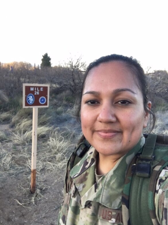 U.S. Air Force Senior Master Sgt. Ruby Tilley, 8th Fighter Wing command post command and control operations superintendent, reaches mile 26 for the 30th annual Bataan Memorial Death March in White Sands Missile Range, N.M., March 17, 2019. Tilley completed the march while wearing a 35 pound rucksack. (courtesy photo)