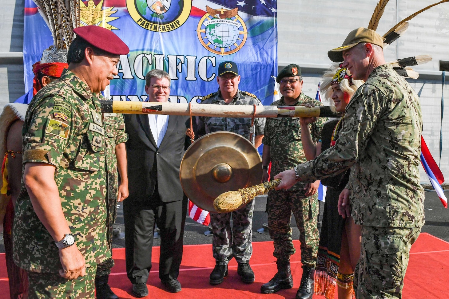 KUCHING, Malaysia (March 30, 2019) – U.S. Navy Capt. Randy Van Rossum, Pacific Partnership 2019 mission commander, rings the ceremonial gong to open Pacific Partnership 2019 in Malaysia. Pacific Partnership, now in its 14th iteration, is the largest annual multinational humanitarian assistance and disaster relief preparedness mission conducted in the Indo-Pacific. Each year the mission team works collectively with host and partner nations to enhance regional interoperability and disaster response capabilities, increase security and stability in the region, and foster new and enduring friendships in the Indo-Pacific.
