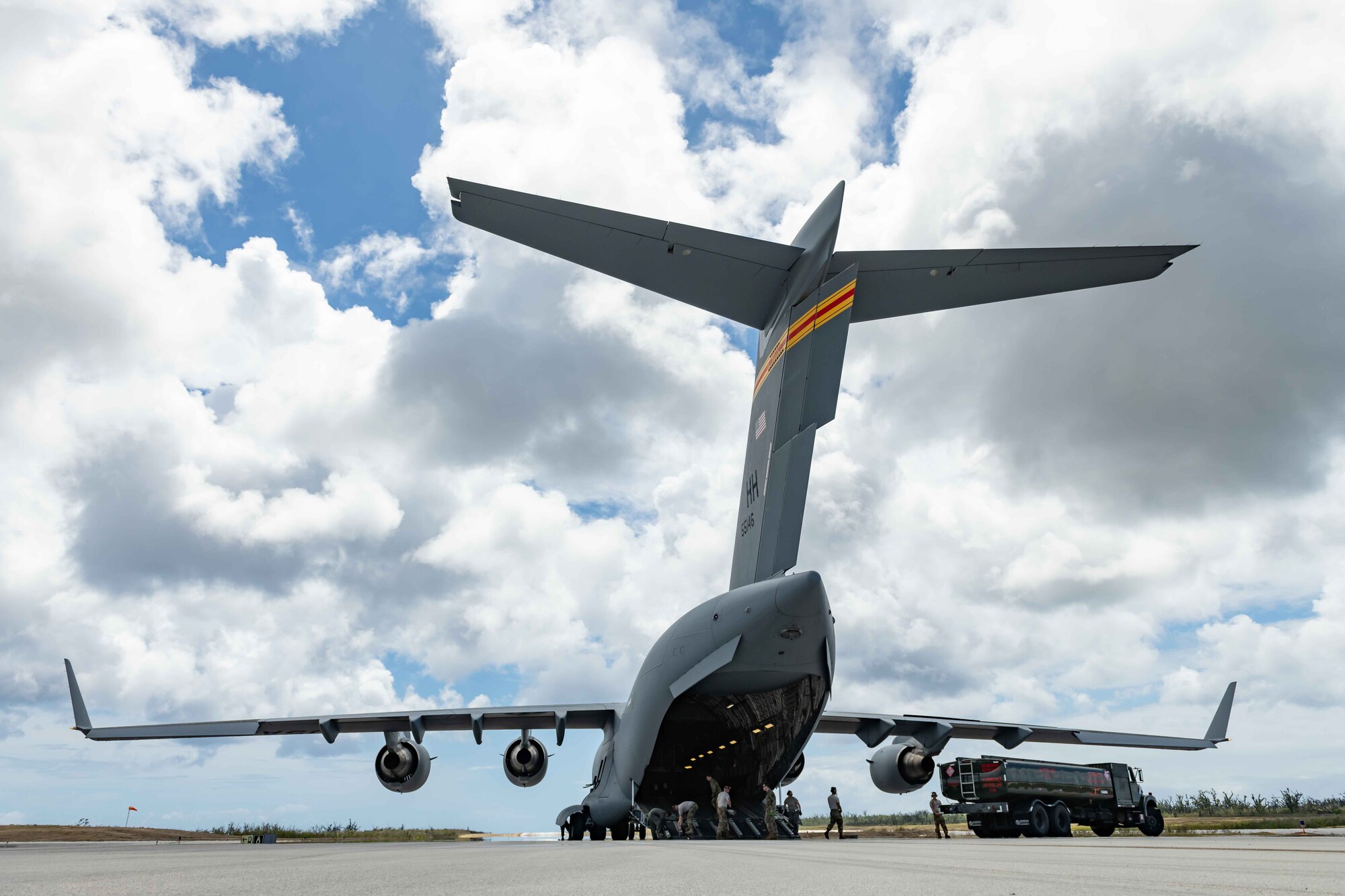 U.S. Air Force Airmen unload a fuel truck from a C-17 Globemaster at Tinian International Airport, Tinian, during exercise Resilient Typhoon, April 23, 2019. The exercise was designed to increase Pacific Air Forces’ ability to rapidly deploy and operate from airfields throughout the region.  (U.S. Air Force photo by Airman 1st Class Matthew Seefeldt)