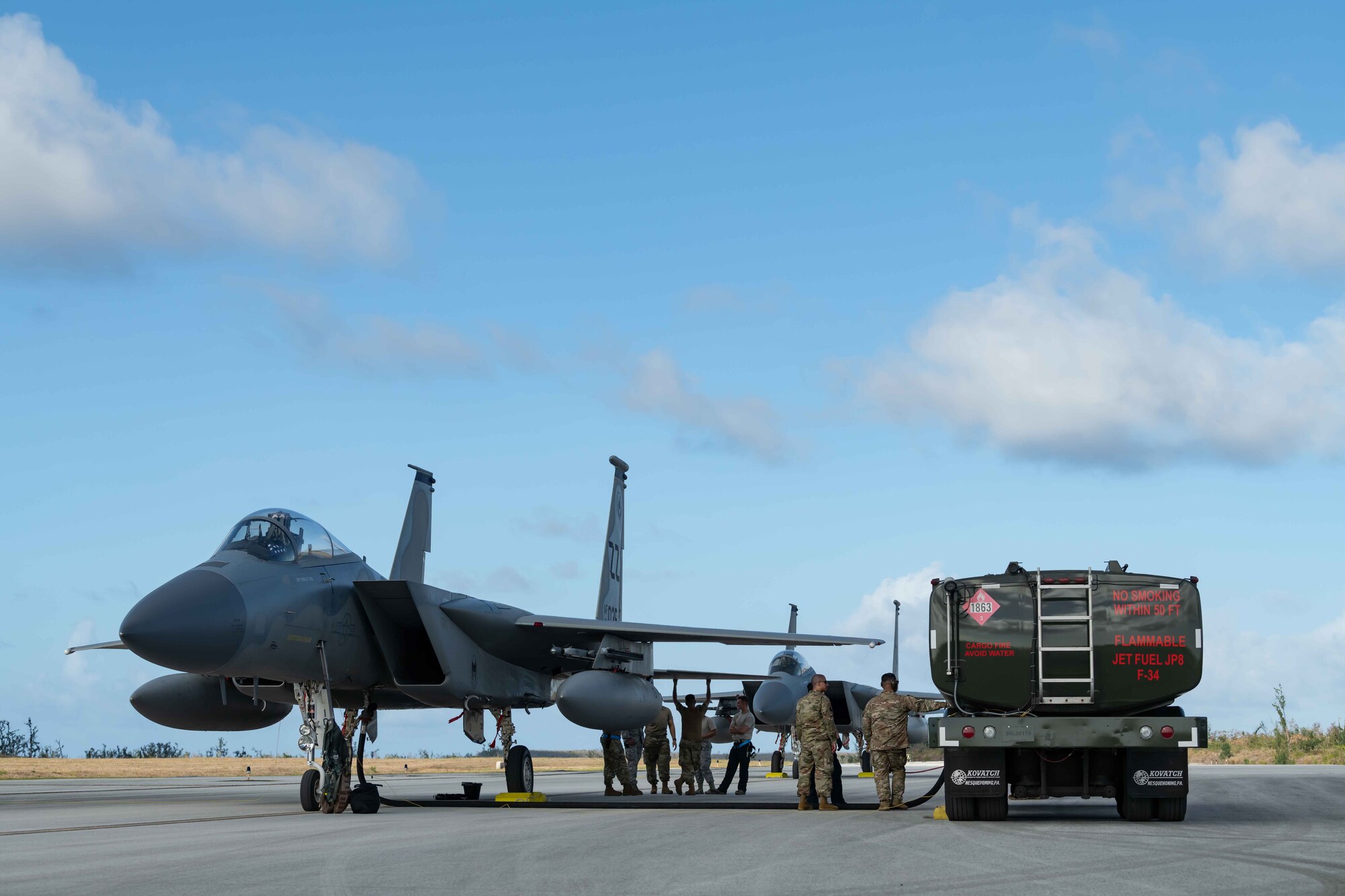 An F-15C Eagle from the 44th Fighter Squadron, Kadena Air Base, Japan, gets refueled at Tinian International Airport, Tinian, during exercise Resilient Typhoon, April 23, 2019.  The aircraft dispersal exercise, based from Andersen Air Force Base, Guam, empowered Airmen at the tactical level to employ new approaches to operations in order to increase resiliency and readiness.  (U.S. Air Force photo by Airman 1st Class Matthew Seefeldt)