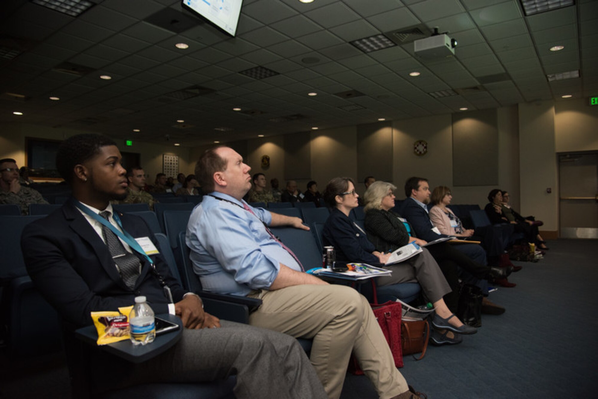 Attendees of the Language, Regional Expertise and Culture Symposium listen to Dr. Paul Fox, New Castle University’s School of Arts and Cultures principal research associate, March 28, 2019, Maxwell Air Force Base, Alabama. Fox educated the attendees about The Cultural Property Protection Estimate and how it can be used as an interoperability planning tool. (U.S. Air Force photo by Senior Airman Alexa Culbert)