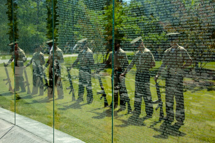 A U.S. Marine rifle squad with Headquarters and Support Battalion, Marine Corps Installations East-Marine Corps Base Camp Lejeune, pauses for a moment of silence during the Vietnam Veterans Recognition Day Ceremony at the Onslow Vietnam Veterans Memorial, Lejeune Memorial Gardens, Jacksonville, North Carolina, April 27, 2019. The ceremony honored the memory of those who died during the war and celebrated the accomplishments and perseverance of Vietnam-era veterans. (U.S. Marine Corps Photo by Lance Cpl. Isaiah Gomez)