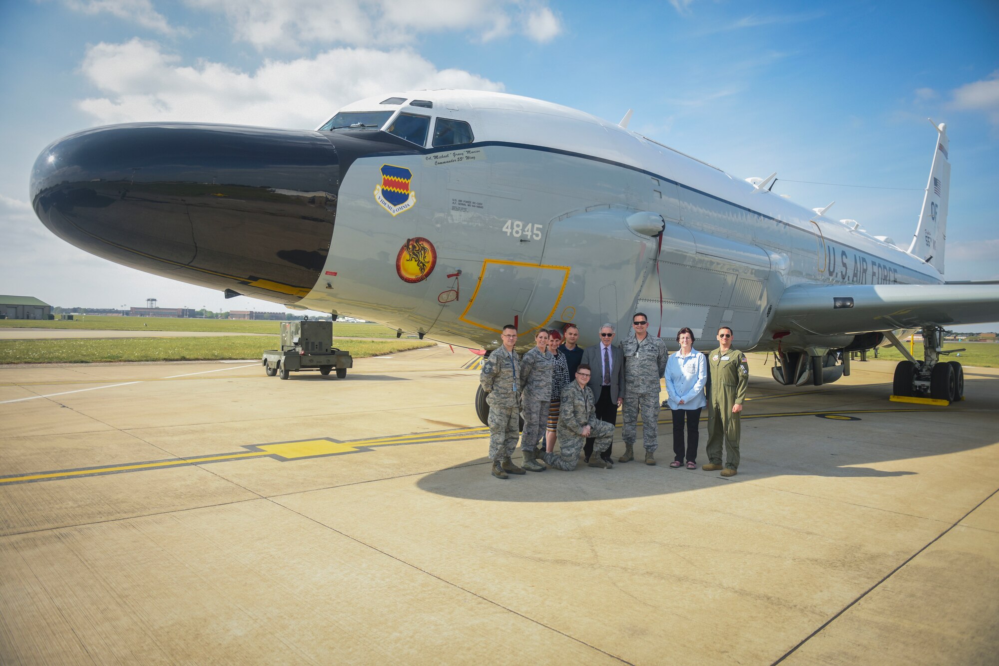 Holocaust survivor Ernest Simon and members of Team Mildenhall pose for a photo at a U.S. Air Force RC-135 Rivet Joint at RAF Mildenhall, England, April 30, 2019. Simon was born in Austria in 1930 and fled to England in 1939 to escape the Nazis.  (U.S. Air Force photo by Airman 1st Class Joseph Barron)