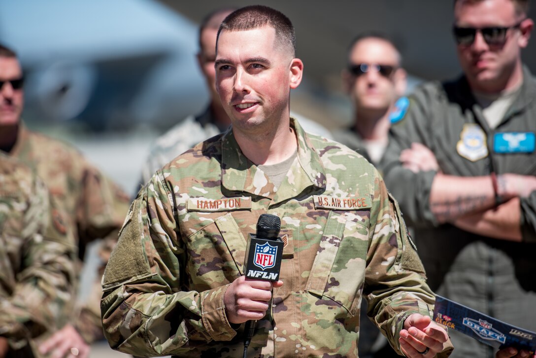 Tech Sgt. Brian Hampton, 512th Maintenance Squadron aerospace ground equipment technician, prepares to announce a Philadelphia Eagles’ draft pick at Dover Air Force Base, Delaware, April 27, 2019. Hampton received the opportunity to announce the Eagles’ pick two weeks after returning home from deployment. (U.S. Air Force photo by Staff Sgt. Damien Taylor)