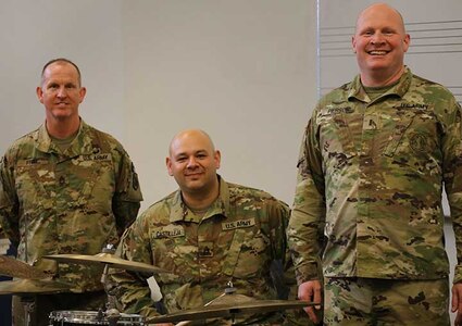 From left to right: Sgt. 1st Class Steve Friel, seated Staff Sgt. Joey Castilleja and Chief Warrant Officer 3 Scott Pierson. Each member recently earned their doctorate degree.