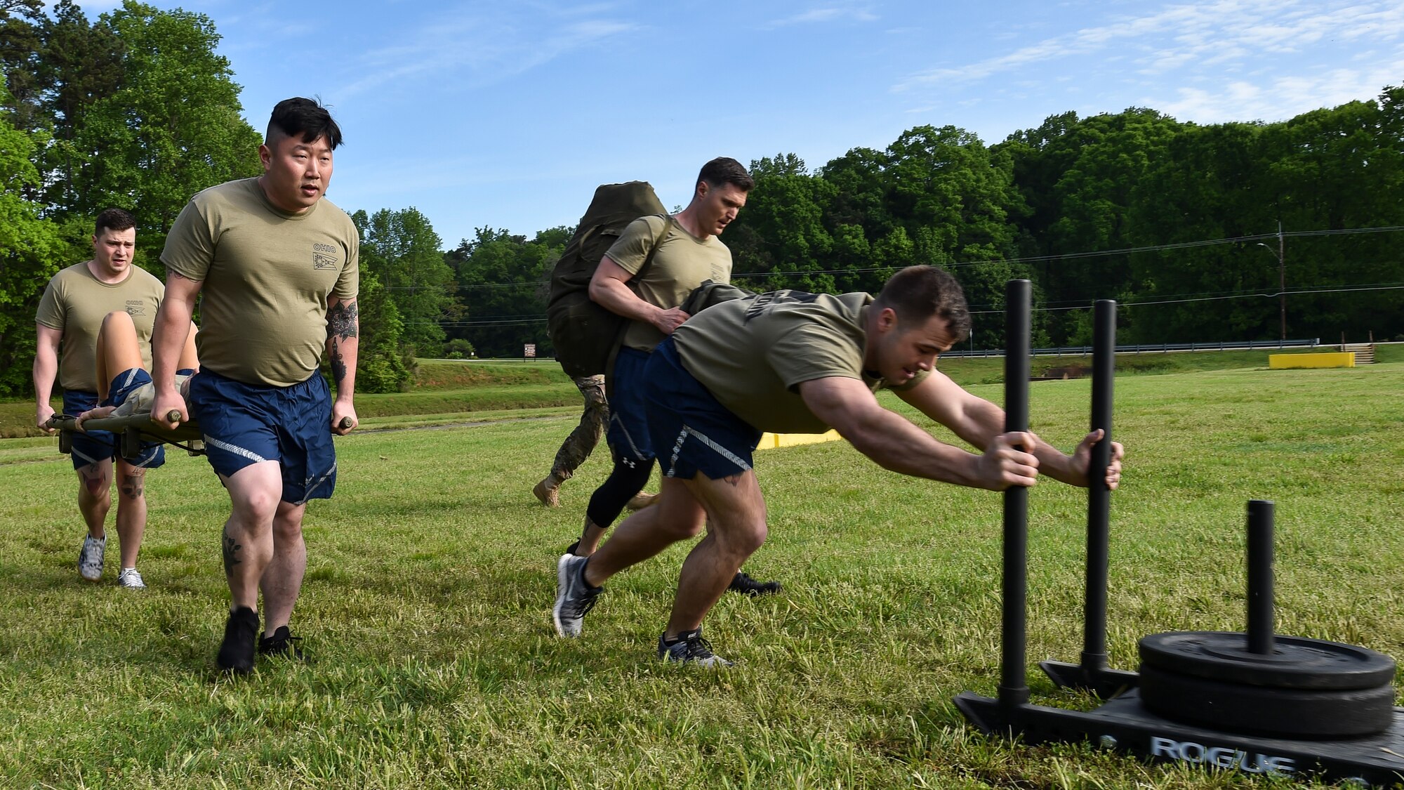 The 76th Aerial Port Squadron team competes in the physical training event on April 24, 2019, during the 2019 Port Dawg Challenge at Dobbins Air Reserve Base, Georgia.