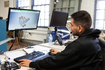 Steve Quiroga views a 3-D model in AUTOCAD at Norfolk Naval Shipyard's Technology and Innovation Lab.