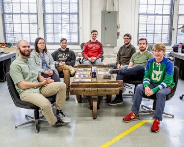 From Left to Right: Brendon Wilkins, Anny Wang, Steve Quiroga, James Keim, Daniel Harding, Matthew Perkinson, and Joey Hoellerith from Norfolk Naval Shipyard's Technology and Innovation Lab.
