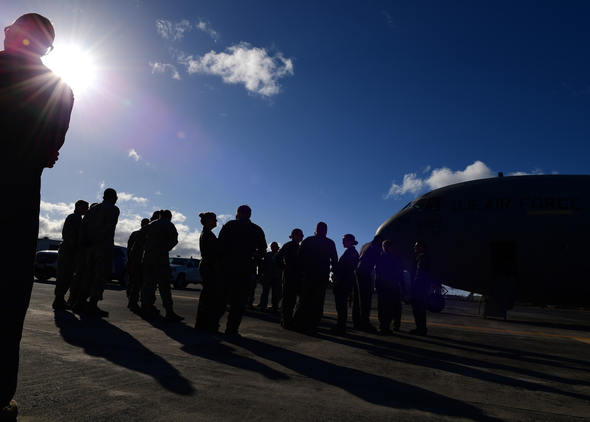 Airmen from the 911th Aeromedical Evacuation Squadron, 914th AES, and 18th Aeromedical Evacuation Detachment 1, based out of Joint Base Pearl Harbor-Hickam, Hawaii but attached to Kadena Air Base, Japan, walk out to a 911th Airlift Wing C-17 Globemaster III at Joint Base Pearl Harbor-Hickam, Hawaii April 25, 2019. The 911th AW Airmen, and the 914th Airmen went to Hawaii to participate in training with 18th AE Detachment 1.(U.S. Air Force Photo by Senior Airman Grace Thomson)