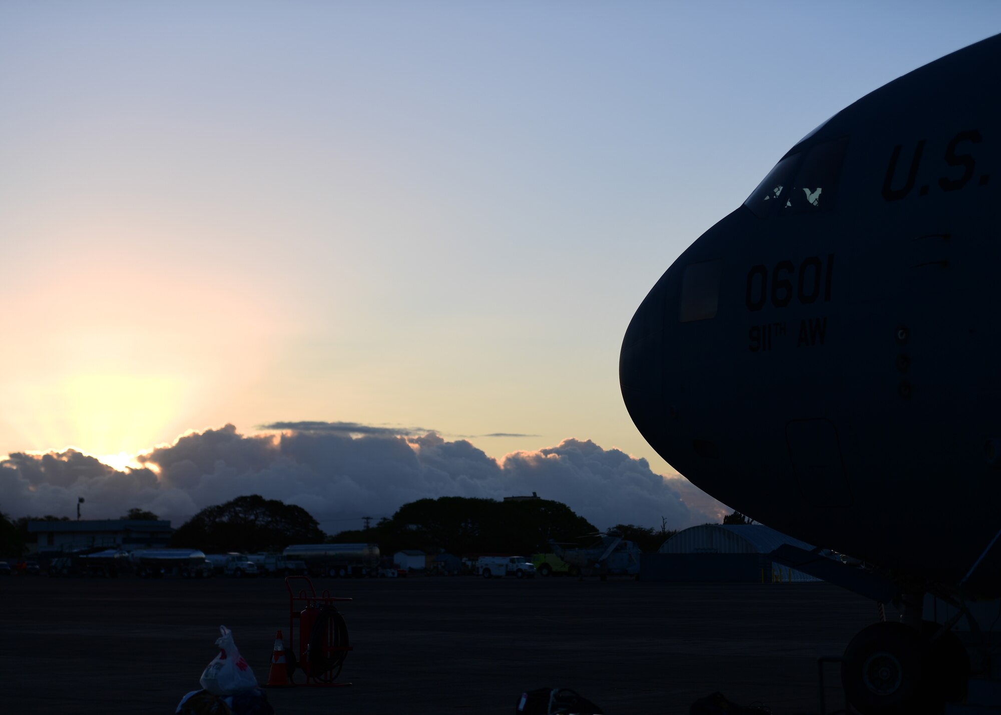 The 911th Airlift Wing C-17 Globemaster III sits ready for takeoff at Barbers Point Airfield, Hawaii April 26, 2019. The aircraft took the 911th Aeromedical Evacuation Squadron to Hawaii to participate in training with the 914th AES as well as with the 18th Aeromedical Evacuation Detachment 1 based out of Joint Base Pearl Harbor- Hickam but attached to Kadena Air Base, Japan. (U.S. Air Force Photo by Senior Airman Grace Thomson)