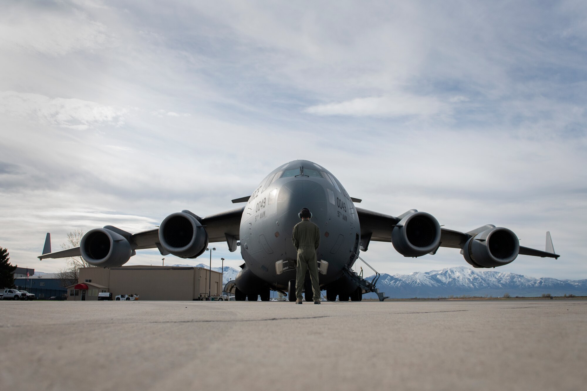 Staff Sgt. Nelson Jones, a loadmaster assigned to the 58th Airlift Squadron, helps prepare a C-17 Globemaster III to taxi, April 20, 2019, Provo, Utah. ROTC cadets from more than five colleges were given tours and flights to demonstrate the professionalism and capabilities of the Air Force. (U.S. Air Force photo by Airman 1st Class Jeremy Wentworth)