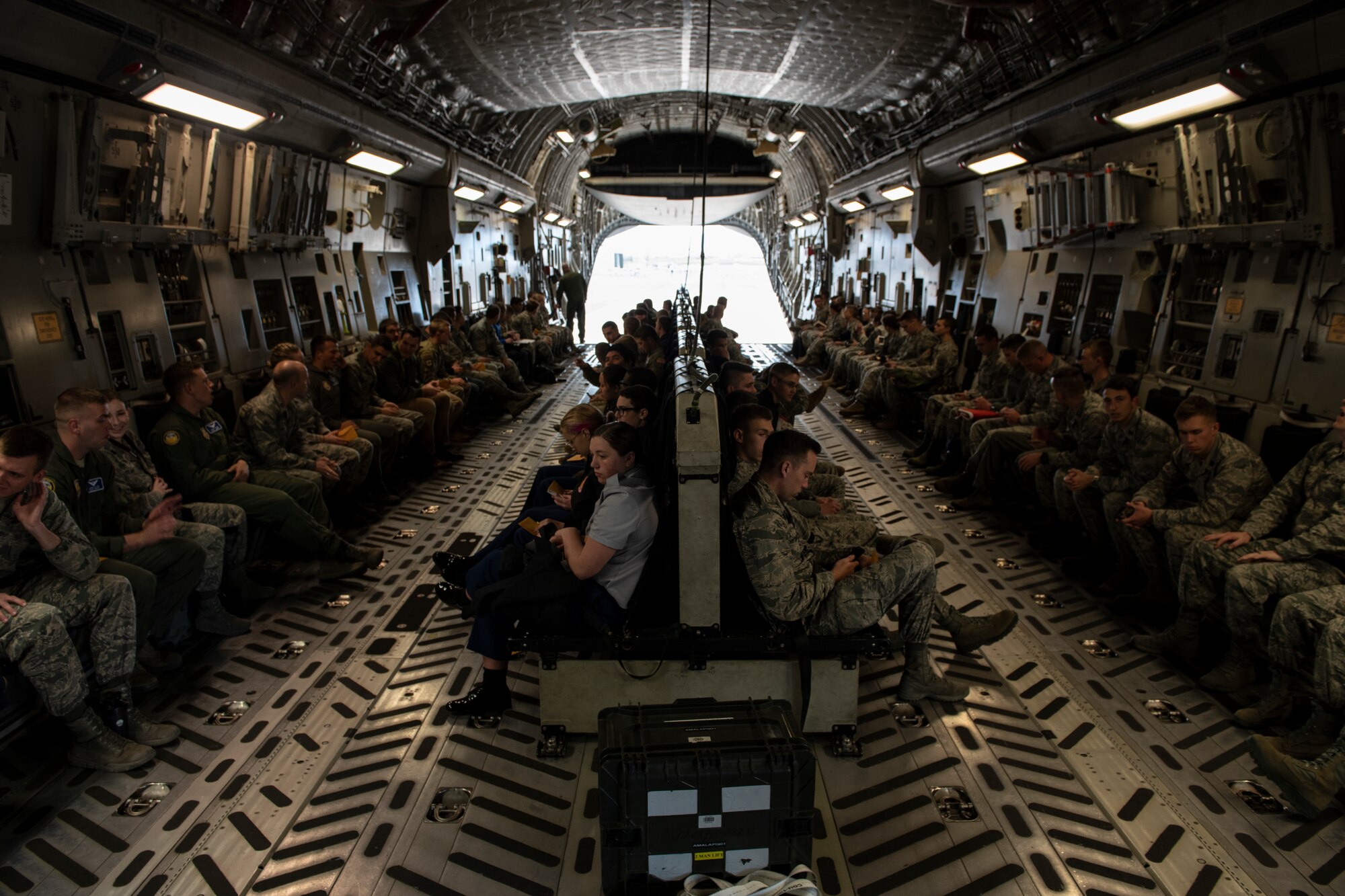 ROTC cadets prepare to take off in a C-17 Globemaster III assigned to the 97th Air Mobility Wing, April 20, 2019, Provo, Utah. The cadets finished a Q&A panel earlier in the day and spoke with the crew about aviation careers in the Air Force. (U.S. Air Force photo by Airman 1st Class Jeremy Wentworth)