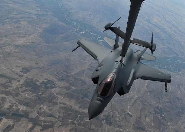 A U.S. Air Force KC-10 Extender refuels an F-35A Lightning II above an undisclosed location, April 30, 2019. The KC-10 and its crew were tasked to support aerial refueling operations for the F-35A's first air interdiction during its inaugural deployment to the U.S. Air Forces Central Command's area of responsibility. (U.S. Air Force photo by Staff Sgt. Chris Drzazgowski)