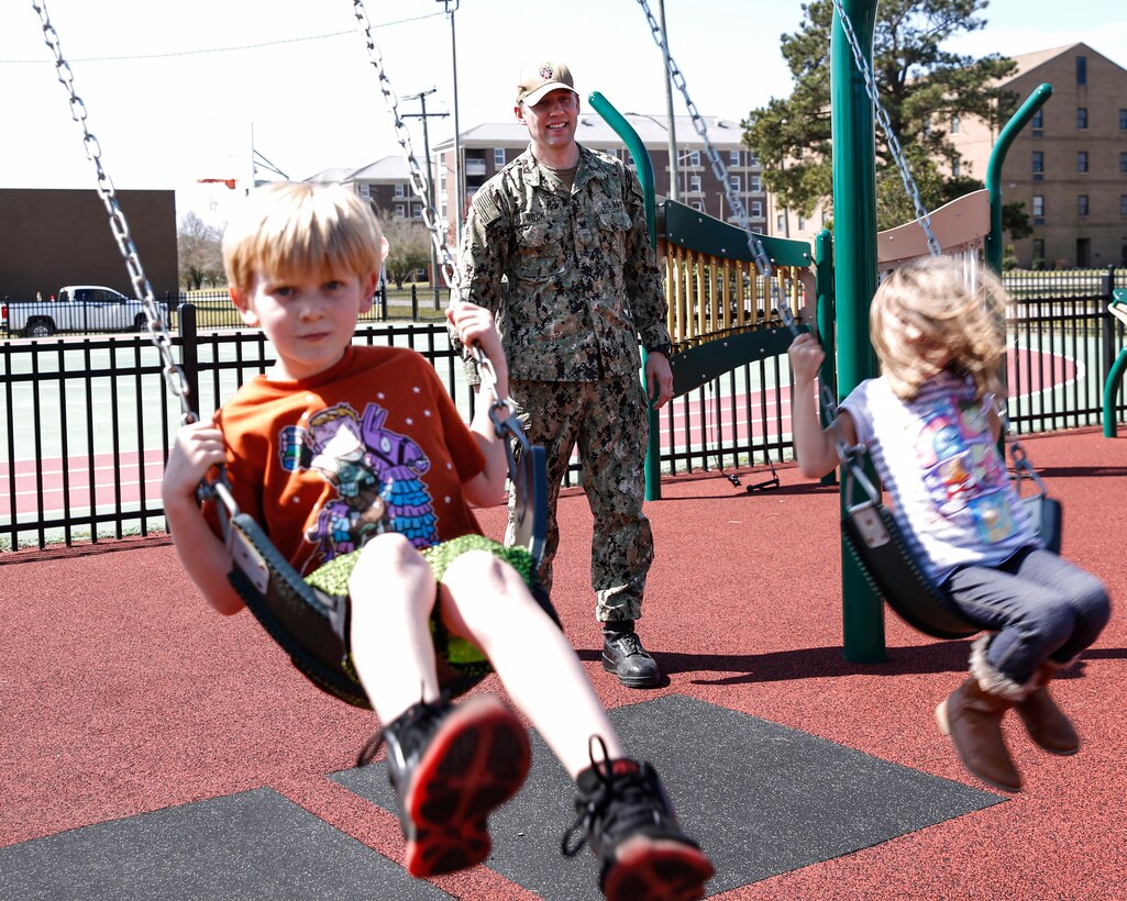 Children from Norfolk Naval Shipyard's youth center gets "first dibs" on the new playground at Scott Annex Center, Portsmouth, Va.