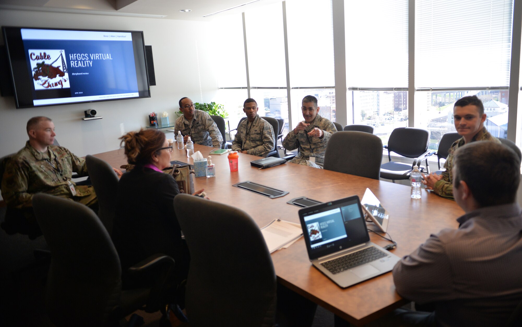 Members of the 55th Communications Group meet with a Booz Allen Hamilton virtual reality development team April 19, 2019, in downtown Omaha, Nebraska. The 25th Air Force provided a kit to be used for unique and innovative training methods. (U.S. Air Force photo by D.P. Heard)