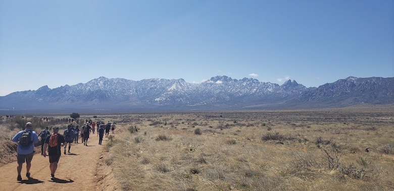 Mountains can be seen as the team marches, March 17, 2019.