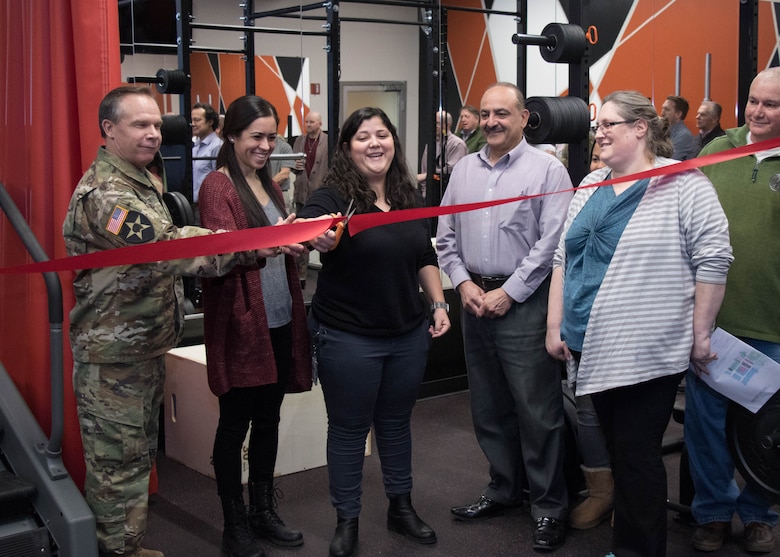 Middle East District Interior Designer Deanna Hardy (2nd from left) during the ribbon cutting for a remodeled Middle East District fitness center. Hardy served as the interior designer on the project management team. As part of the team, Hardy was able to practice project management skills that she used when she was made the lead project manager for the renovation of the District's headquarters in Winchester, VA.