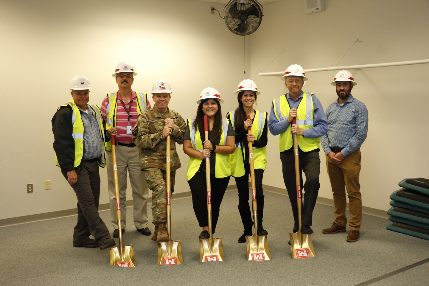 Middle East District Interior Designer Deanna Hardy (3rd from right) during the ground breaking for a remodeled Middle East District fitness center. Hardy served as the interior designer on the project management team. As part of the team, Hardy was able to practice project management skills that she used when she was made the lead project manager for the renovation of the District's headquarters in Winchester, VA.