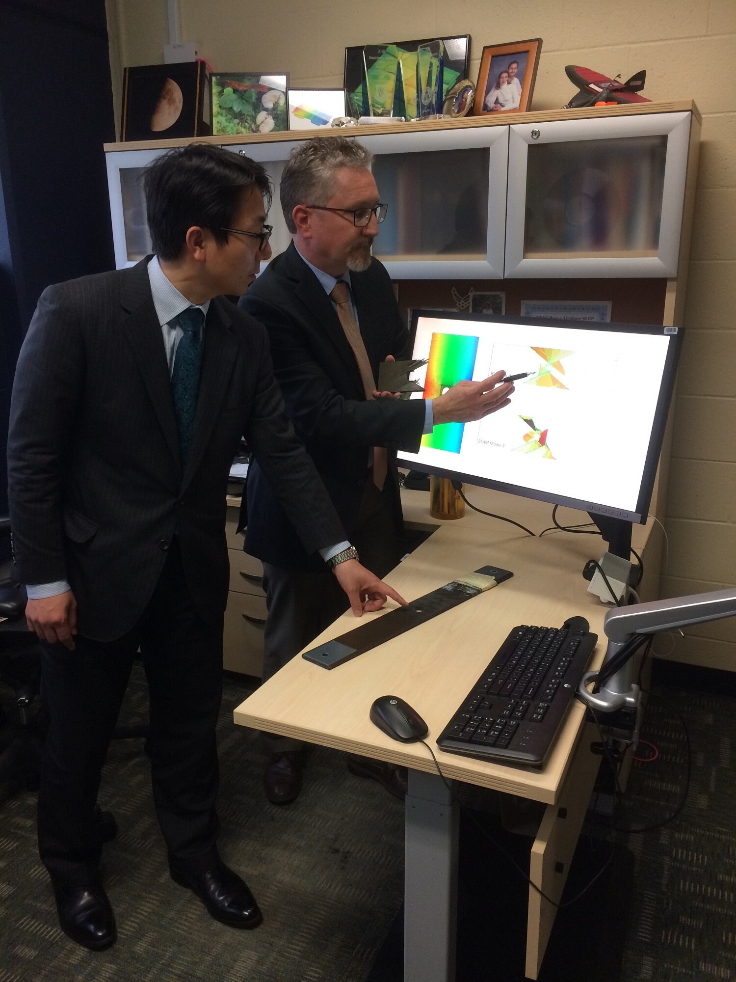 Dr. Keisuke Umezawa and Dr. David Mollenhauer partner to research usability, capability and needs of research software. (U.S. Air Force photo/Donna Lindner)