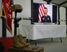 Identification tags for Spc. Ryan Riley hang from the Fallen Soldier Cross during a unit memorial service in Qayyarah West Airfield, Iraq, April 25, 2019. The Fallen Soldier Cross, also known as a Battle Cross, dates back to at least the American Civil War as a means of identifying the location of fallen Soldiers on the field. Today it is often a means of showing respect for the dead among the living members of the unit.