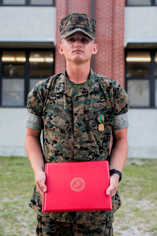 Lance Cpl. Caleb Eudy, with Charlie Company, 1st Recruit Training Battalion, is awarded a Navy and Marine Corps Achievement Medal on Parris Island, S.C. April 26, 2019.