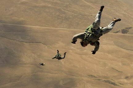 U.S. Army soldier from the Utah Army National Guard, descend during a static line jump, Fairfield, Utah, Nov. 9, 2011.