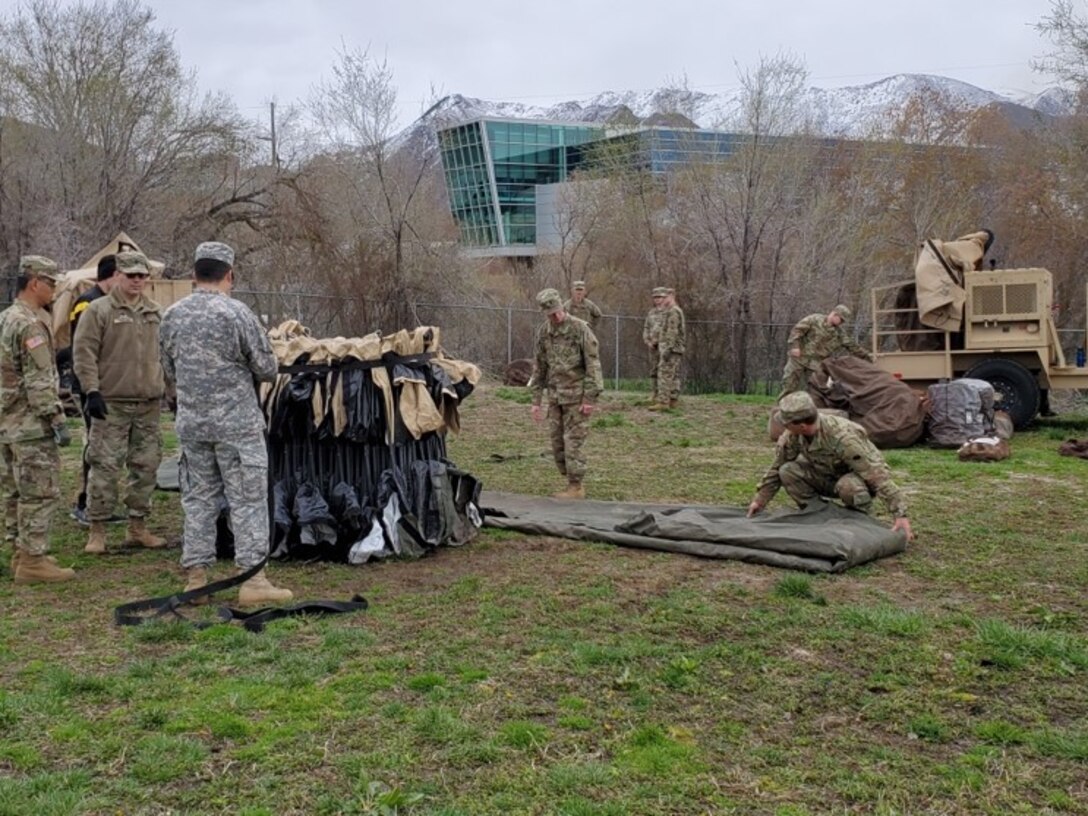 U.S. Army Reserve Soldiers of the 850th Signal Company, based out of Fort Douglas, Utah, participate in a Communications Exercise (COMEX) in preparation for CSTX at Fort Hunter Liggett. Links to the satellite were successfully established without intervention from personnel out the company.