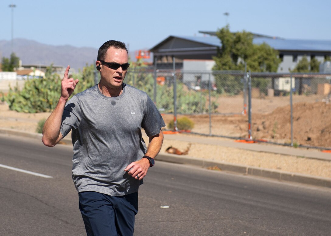An Airman runs during the Cajun Remembrance Run April 30, 2019, at Luke Air Force Base, Ariz.