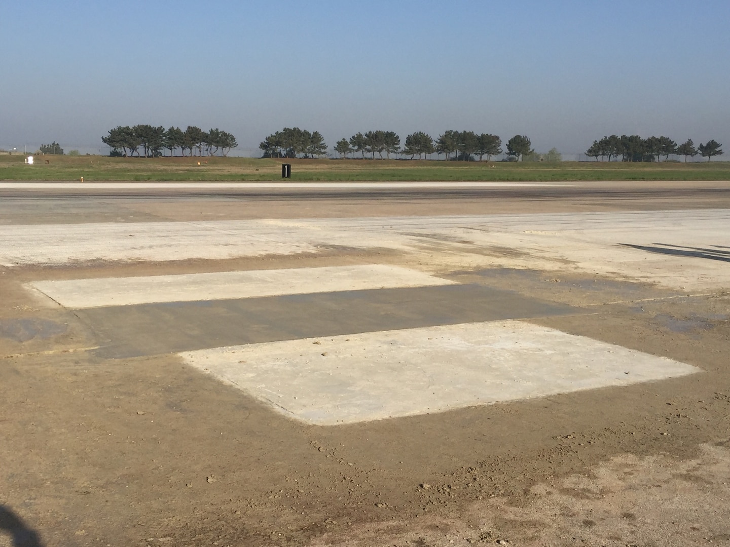 The 8th Civil Engineer Squadron, the Legendary Red Devils, completed a repair on a 7 foot by 8 foot surface and 4 foot deep sinkhole on the runway at Kunsan Air Base, Republic of Korea, May 2, 2019. The 8th Civil Engineer Squadron and 8th Logistics Readiness Squadron made the flight line operational again just 24 hours after it was shut down to repair a sinkhole. (Courtesy photo)