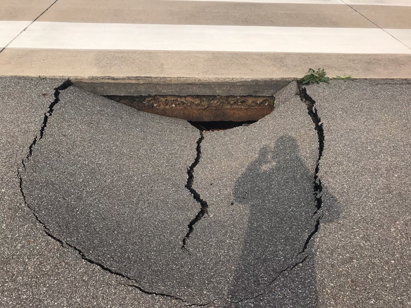 A 7 feet by 8 feet sinkhole was discovered on the runway at Kunsan Air Base, Republic of Korea, May 2, 2019. The 8th Civil Engineer Squadron and 8th Logistics Readiness Squadron made the flight line operational again just 24 hours after it was shut down to repair a sinkhole. (Courtesy photo)