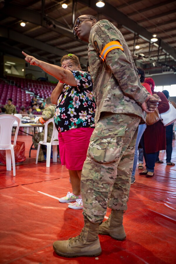 A U.S. Army Soldier provides optometry care to a patient at Ponce, Puerto Rico, April 30, 2019, during Innovative Readiness Training Puerto Rico. The purpose of the IRT Puerto Rico is to provide dental, optometry and medical care to the community while performing joint military humanitarian operations. Marine Forces Reserve is participating in IRT Puerto Rico 2019 in order to maintain military readiness while strengthening alliances with partners. (U.S. Marine Corps photo by Sgt. Andy O. Martinez)