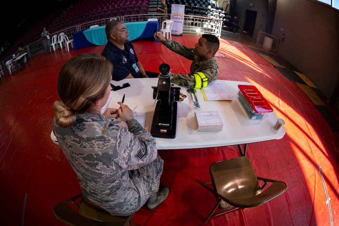 Service members provide optometry care to patients at Ponce, Puerto Rico, April 27, 2019, during Innovative Readiness Training Puerto Rico. The purpose of the Innovative Readiness Training Puerto Rico is to provide dental, optometry and medical care to the community while performing joint military humanitarian operations. Marine Forces Reserve is participating in IRT Puerto Rico 2019 in order to maintain military readiness while strengthening alliances with partners. (U.S. Marine Corps photo by Sgt. Andy O. Martinez)
