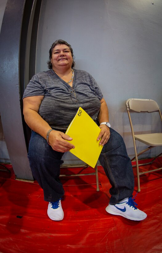 A patient waits for her turn to receive medical care at Ponce, Puerto Rico, April 27, 2019, during Innovative Readiness Training Puerto Rico. The purpose of the Innovative Readiness Training Puerto Rico is to provide dental, optometry and medical care to the community while performing joint military humanitarian operations. Marine Forces Reserve is participating in IRT Puerto Rico 2019 in order to maintain military readiness while strengthening alliances with partners. (U.S. Marine Corps photo by Sgt. Andy O. Martinez)