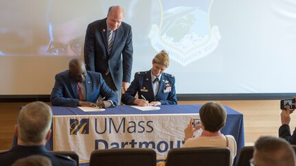 Commander of the 102nd Intelligence Wing, Col. Virginia I. Gaglio and UMass Dartmouth Chancellor Robert E. Johnson signed a memorandum of understanding on April 29, 2019, agreeing to work together to develop mutually beneficial cybersecurity training and workforce development programs.