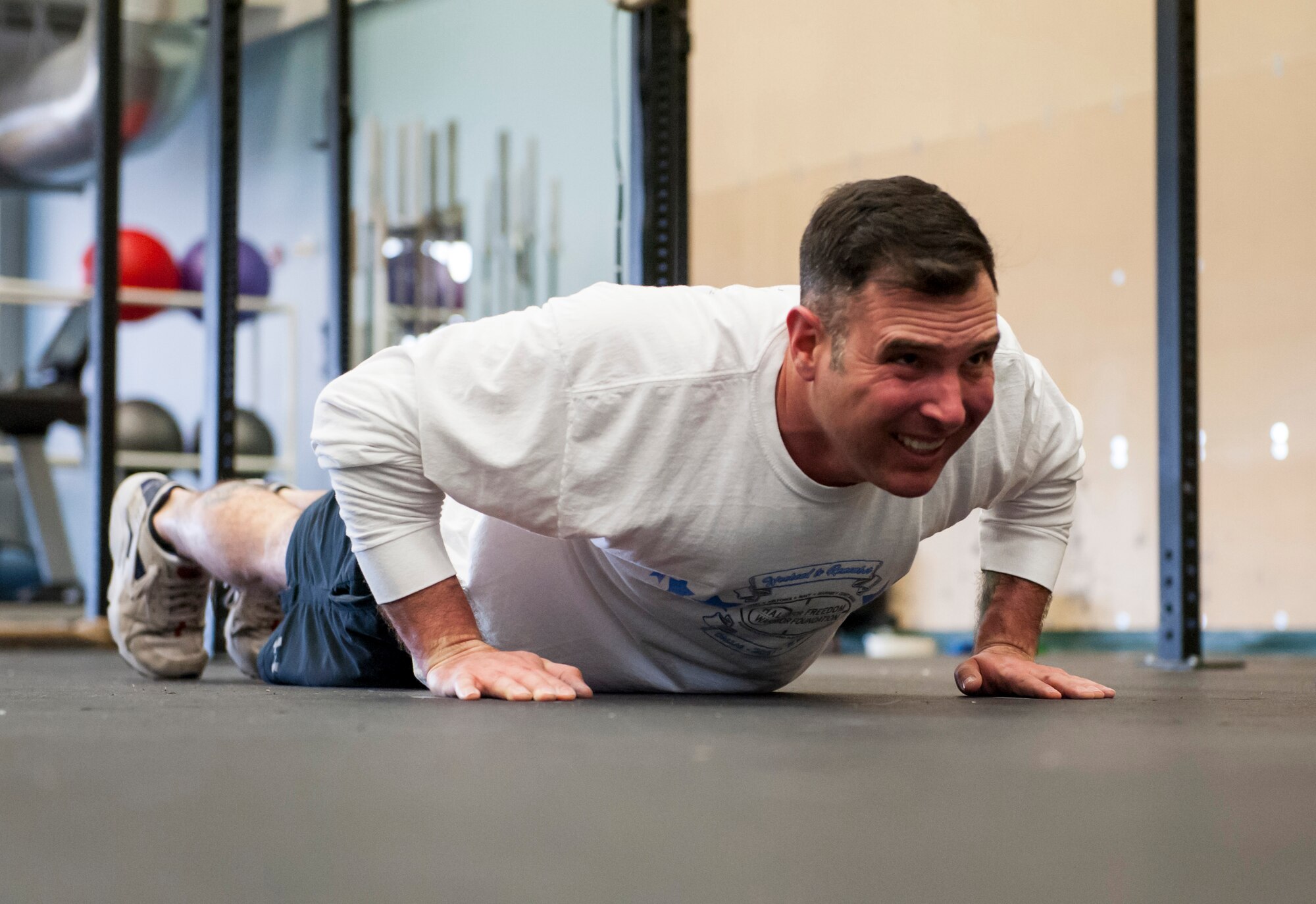 Master Sgt. Christopher Dangelo, 490th Missile Squadron NCO in charge of operations, performs a push-up during a “Wing One” fitness class April 29, 2019, at Malmstrom Air Force Base, Mont.