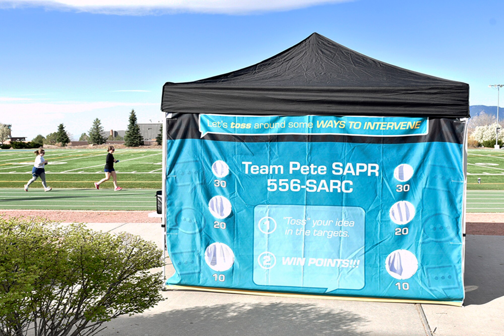 21st Space Wing Sexual Assault Prevention and Response team run a Walk-a-Lap event in support of sexual assault awareness and prevention month