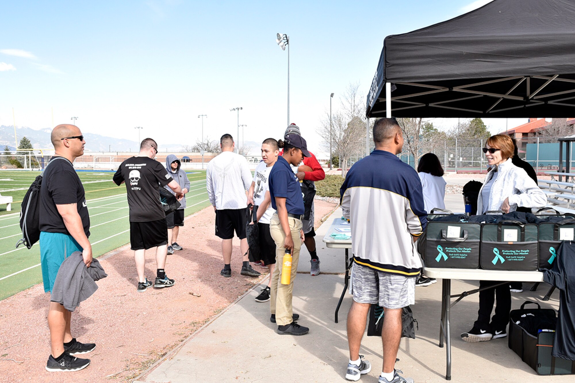 21st Space Wing Sexual Assault Prevention and Response team run a Walk-a-Lap event in support of sexual assault awareness and prevention month